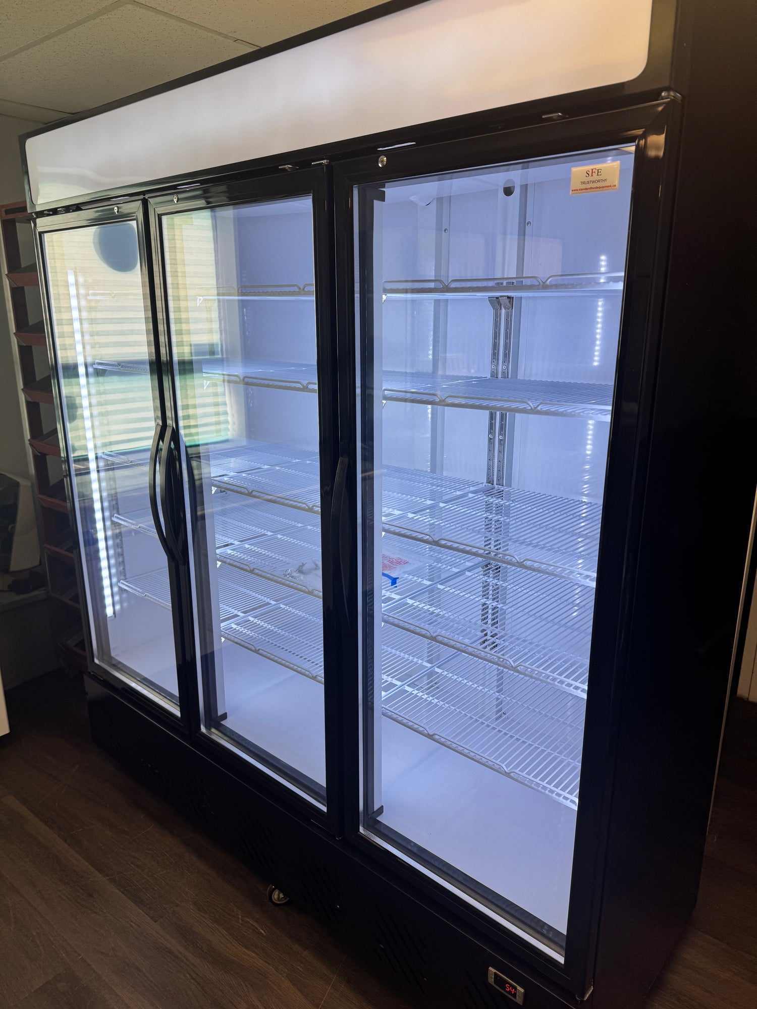 3-door commercial glass merchandiser cooler with energy-efficient LED lighting